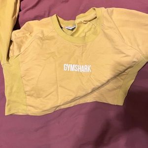 Yellow GymShark crop top sweater.